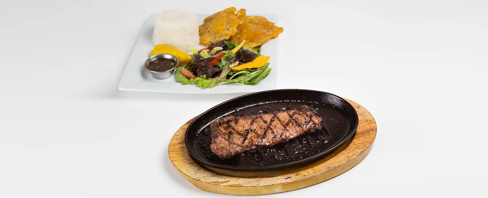 Churrasco New York steak with patacones