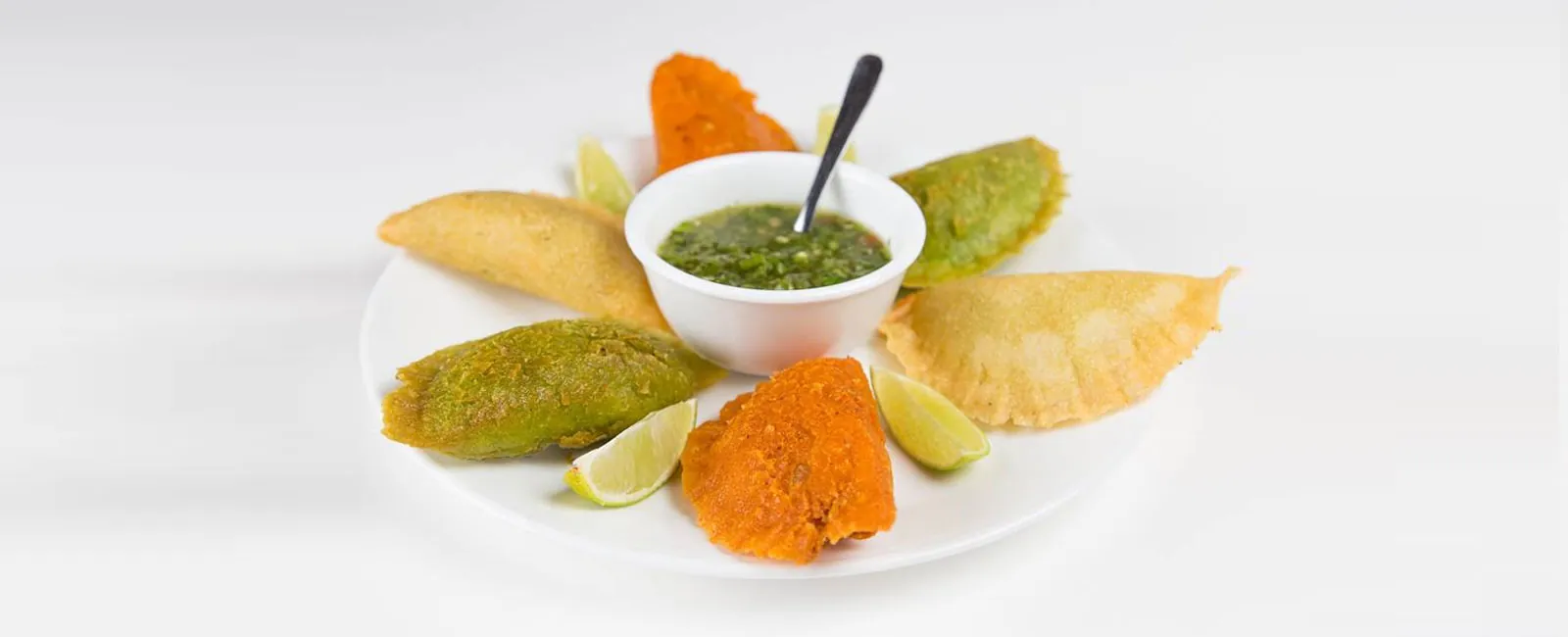 Colombian empanadas served with ají