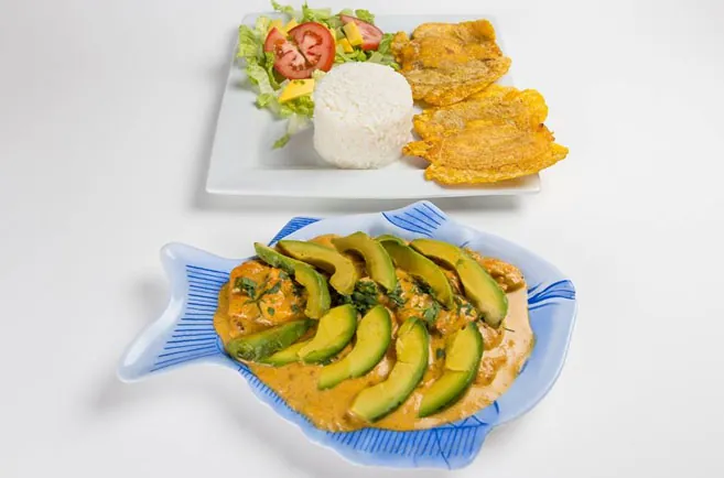 Fish fillet in coconut sauce with avocado